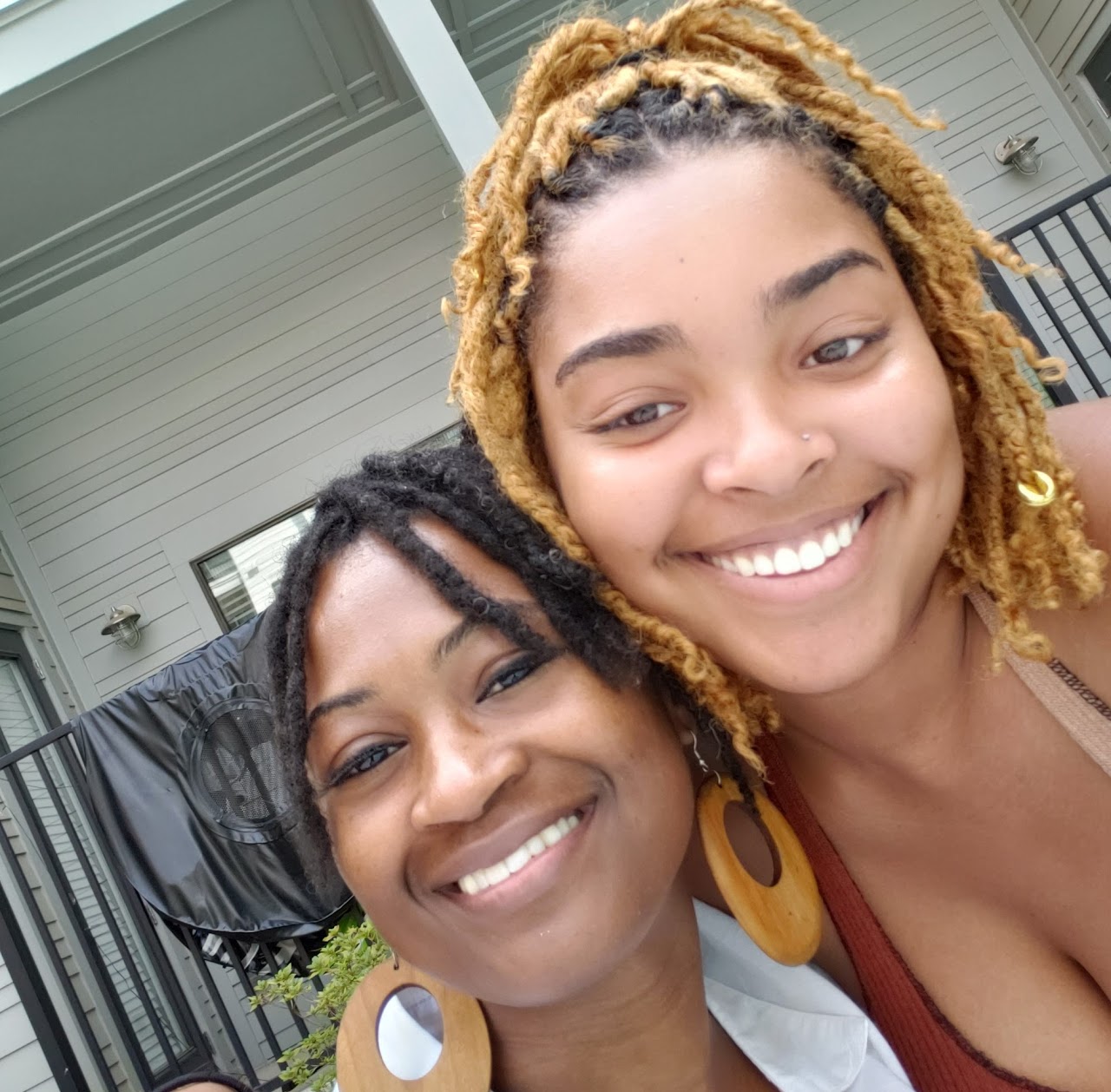 Women gathered together in community through I Am She Officially